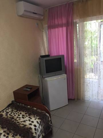 Фото номера Двухместный номер с 2 отдельными кроватями Гостевой дом Романтика г. Николаевка 7