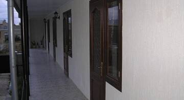 Фото номера Трехместный номер эконом-класса Гостиница Polis г. Николаевка 5