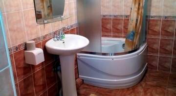 Фото номера Семейный полулюкс Гостиница Polis г. Николаевка 4