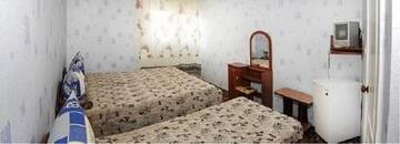 Фото номера Стандартный трехместный номер Гостиница on Trudovaya 26 г. Николаевка 4