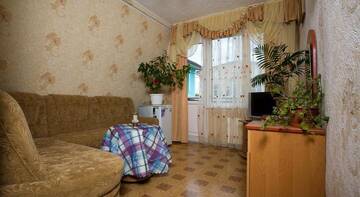 Фото номера Семейный номер с балконом Гостиница Фортуна г. Николаевка 4