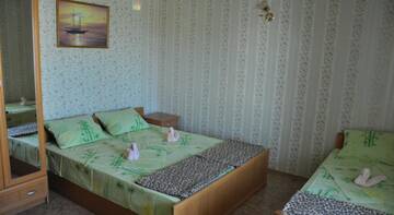 Фото номера Четырехместный номер Гостевой дом Inn laguna г. Николаевка 2