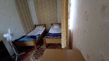 Фото номера Бюджетный двухместный номер с 2 отдельными кроватями Гостевой дом У Фаины г. Николаевка 9