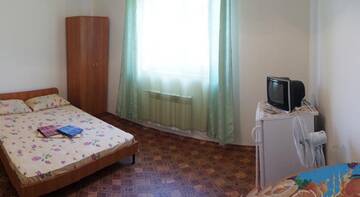 Фото номера Двухместный номер с 1 кроватью Гостиница KrymVodoley г. Николаевка 5